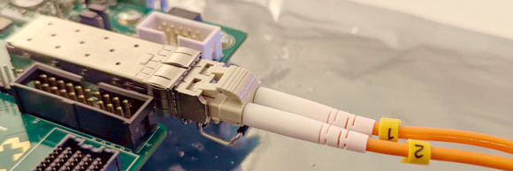 Image of an optical fiber connected to the KC705 board