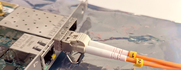 Image of an optical fiber connected to the KCU105 board